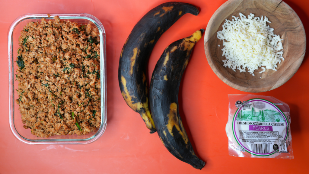 yellow plantain, platano maduro, with picadillo and mozzarella cheese